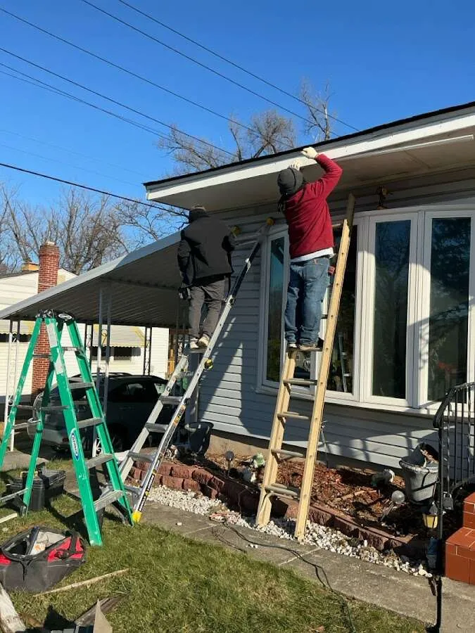 Restoration crew performing exterior repair in Hales Corners